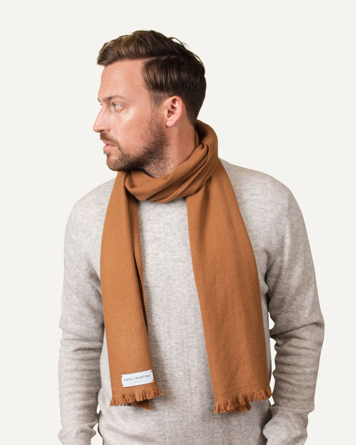 Woven cashmere scarf in camel for men by MOGLI & MARTINI #colour_amber