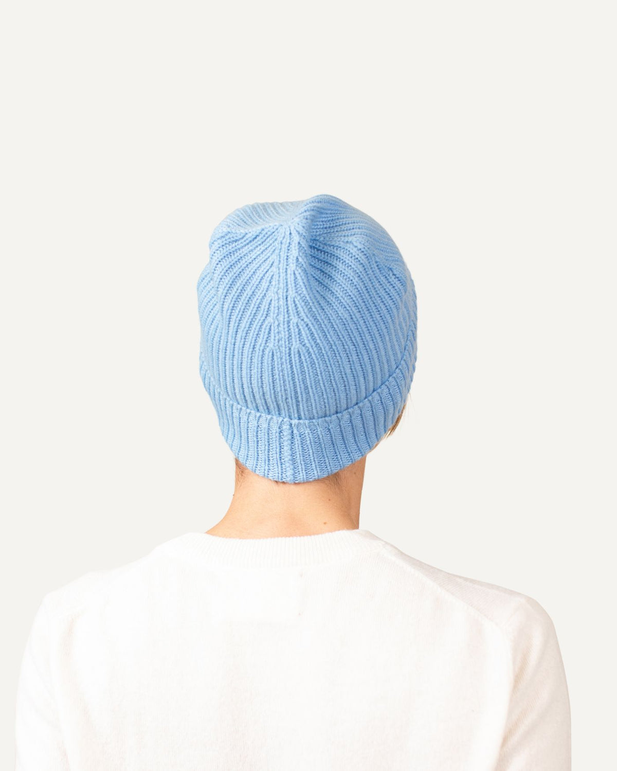 Cashmere knitted hat for women in dark blue by MOGLI & MARTINI #color_azur